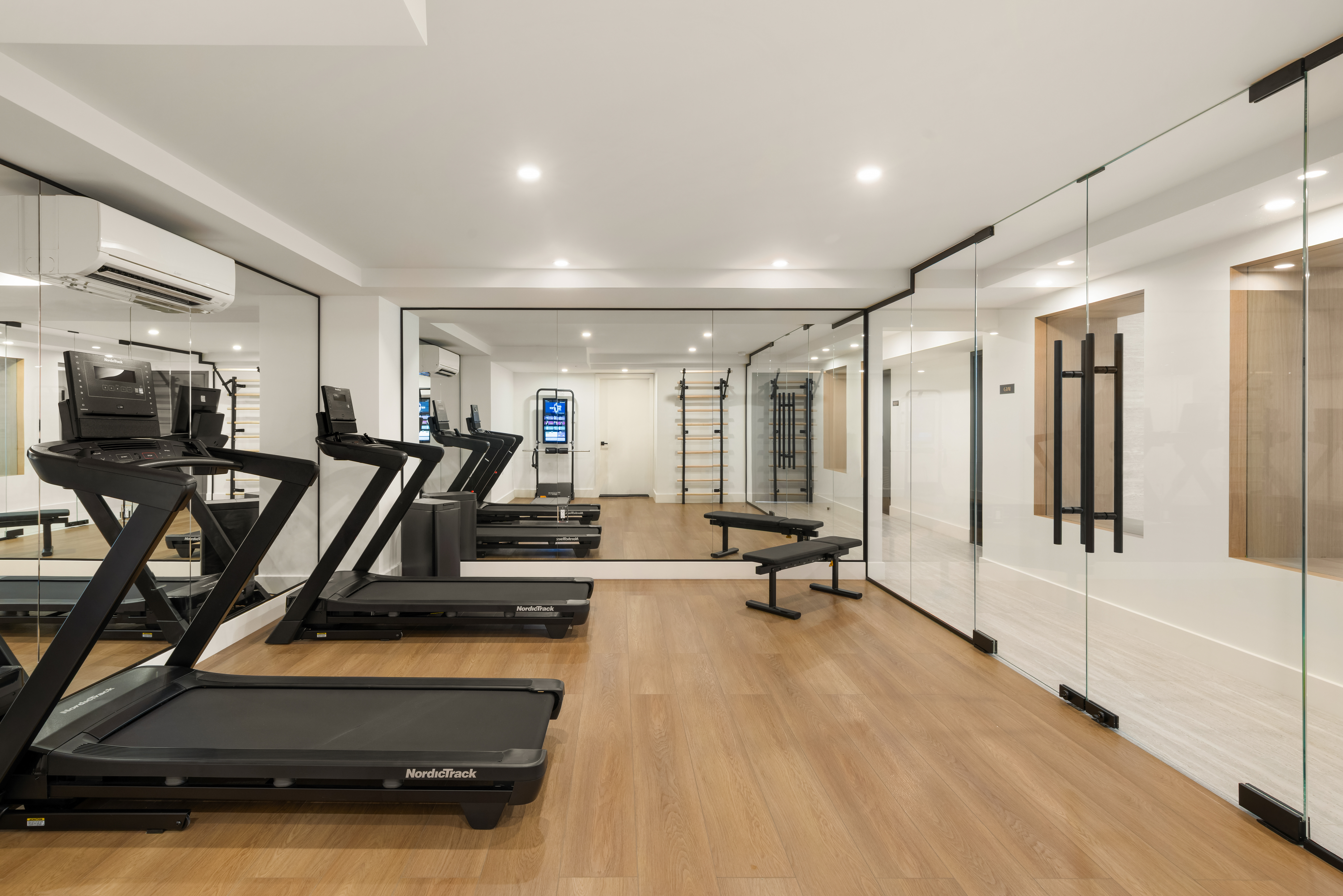 420 East 75th Street, Unit PH Manhattan, NY 10021 - Photo 18 of 24 a view of a room with gym equipment