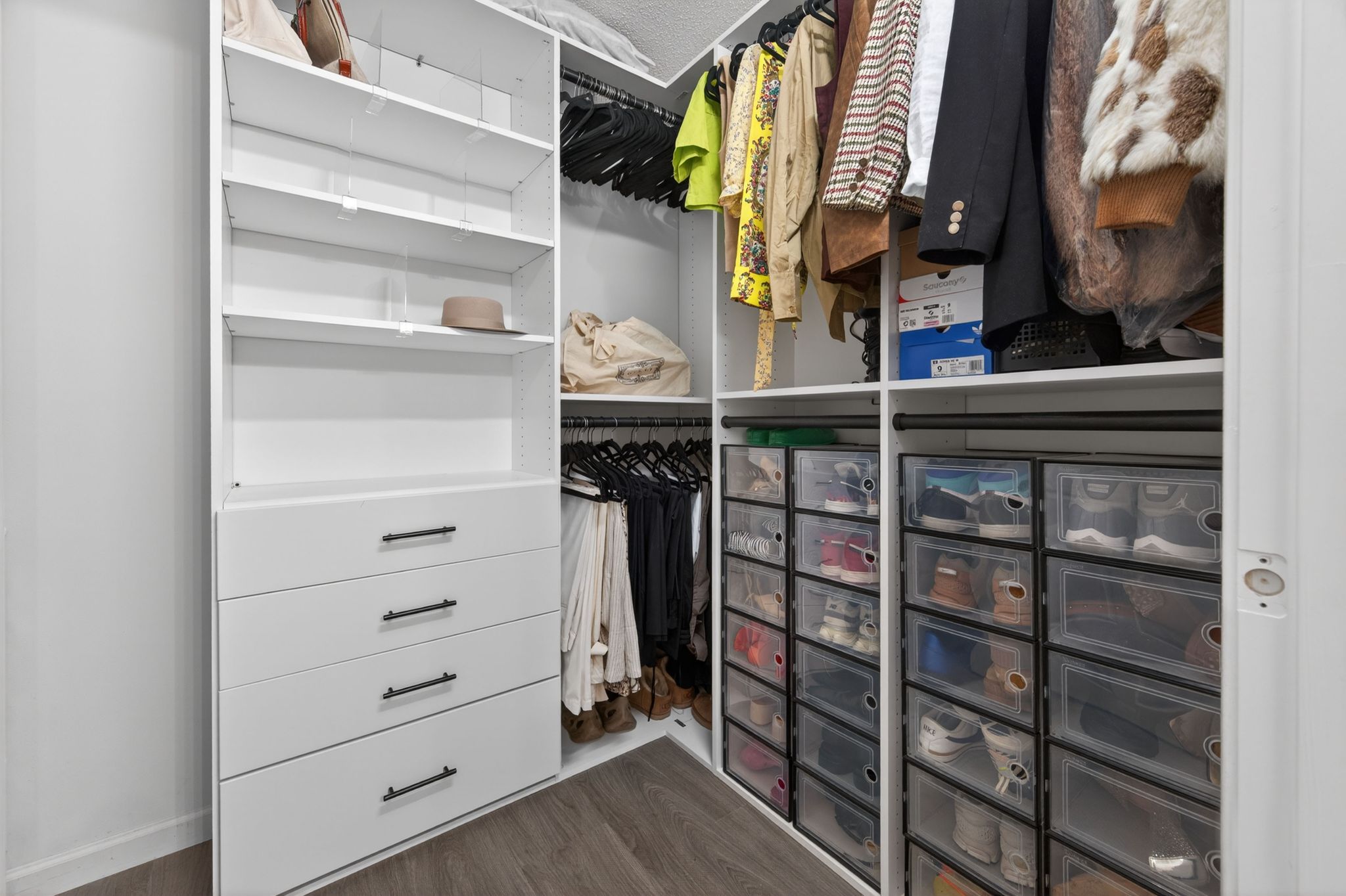 Huntscroft Lane Raleigh, NC 27617 - Photo 36 of 49 a view of walk in closet with clothes and shoes