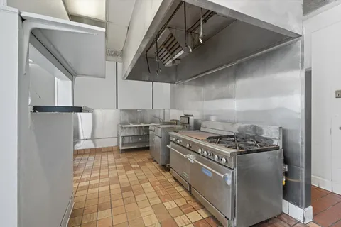a view of a livingroom with furniture and windows
