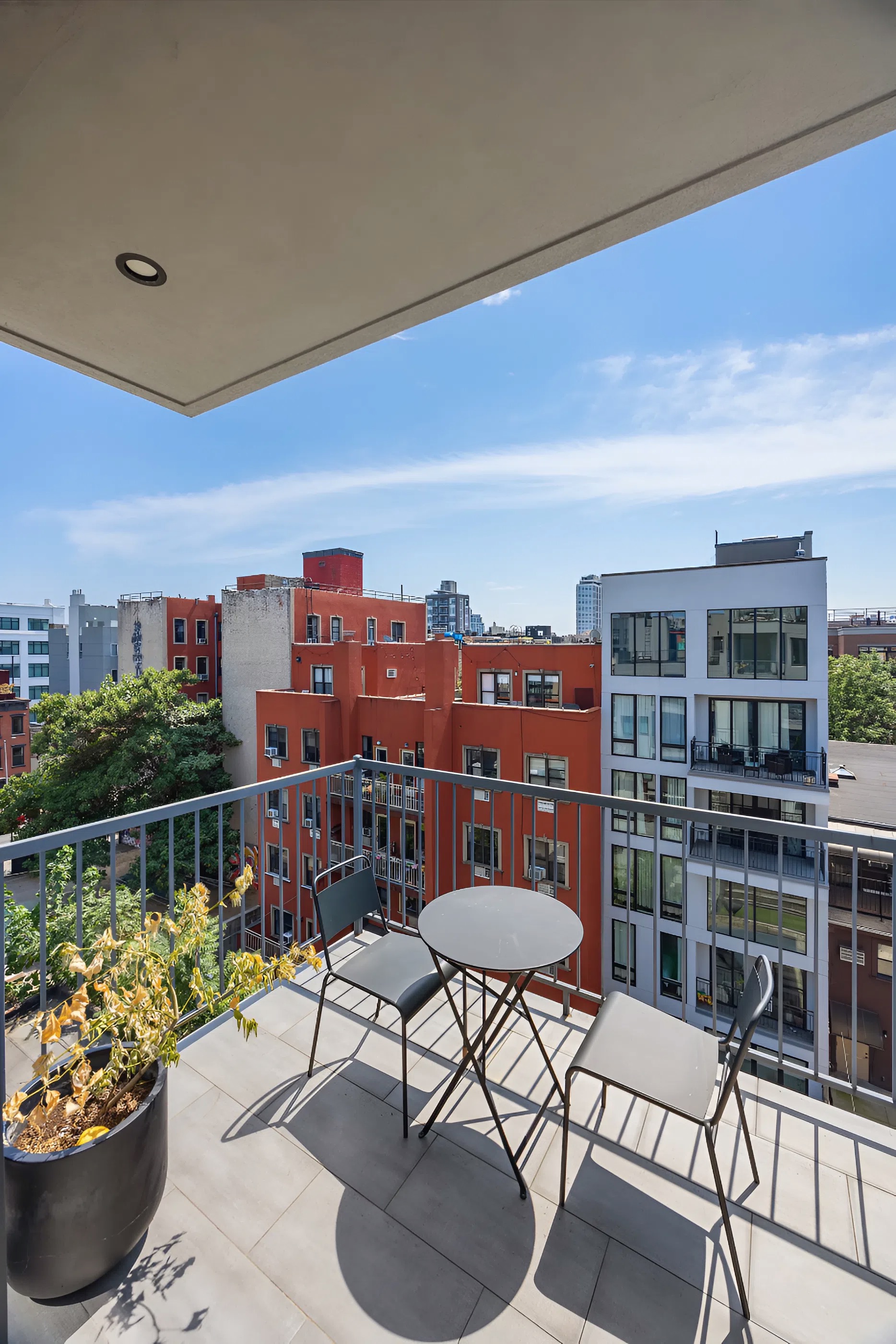 340 Metropolitan Avenue, Unit PHB Brooklyn, NY 11211 - Photo 15 of 18 a view of a chairs and table in the terrace