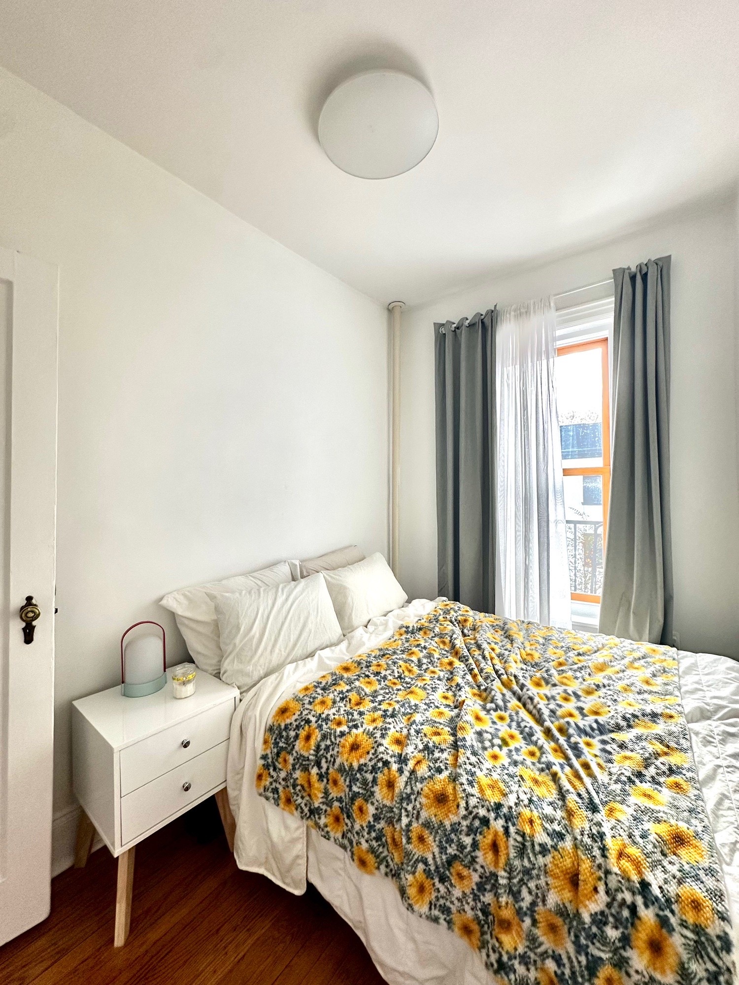 85 Bergen Street, Unit 2C Brooklyn, NY 11201 - Photo 5 of 6 a bedroom with a bed and wooden floor