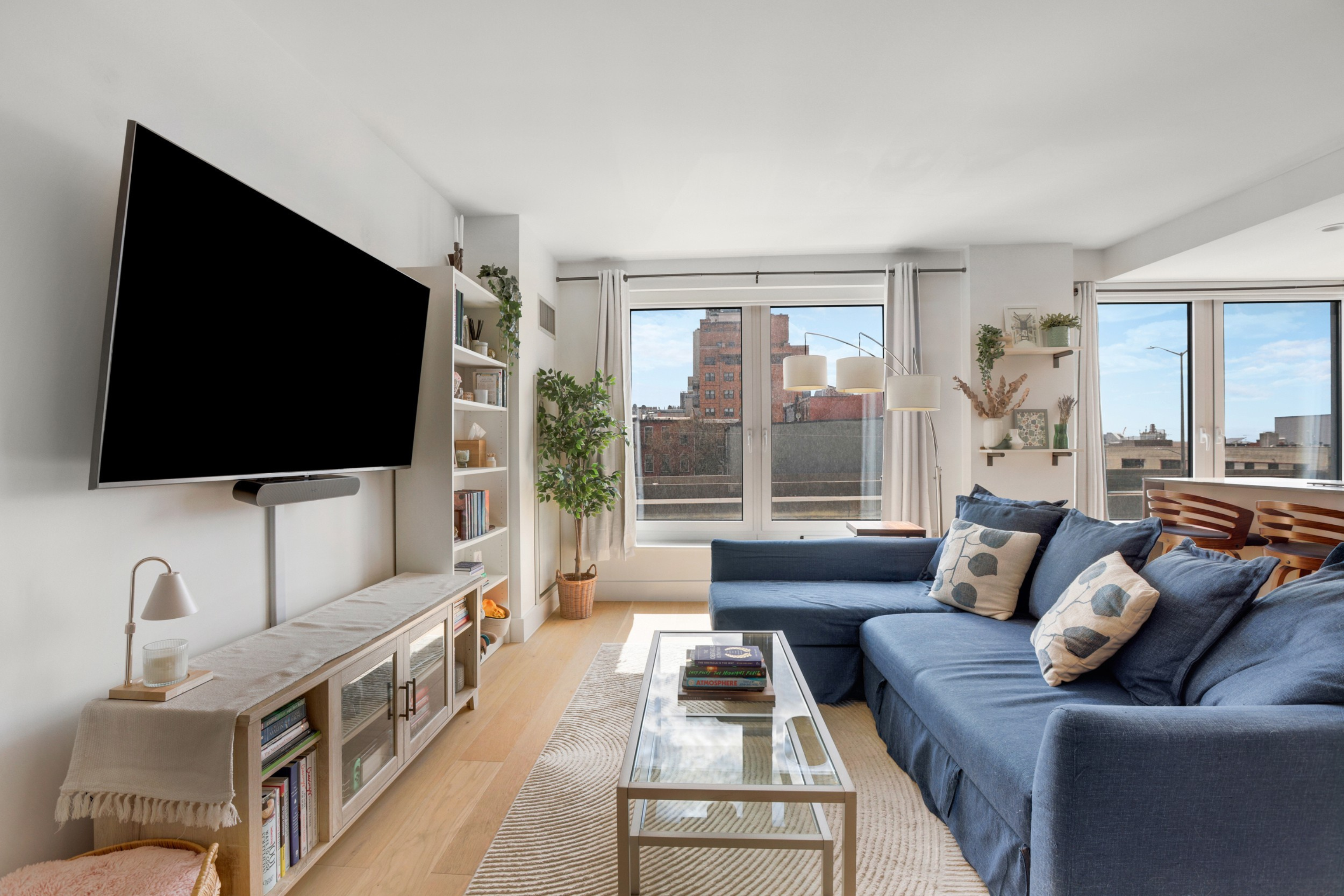575 4th Avenue, Unit 3F Brooklyn, NY 11215 - Photo 5 of 20 a living room with furniture and a flat screen tv