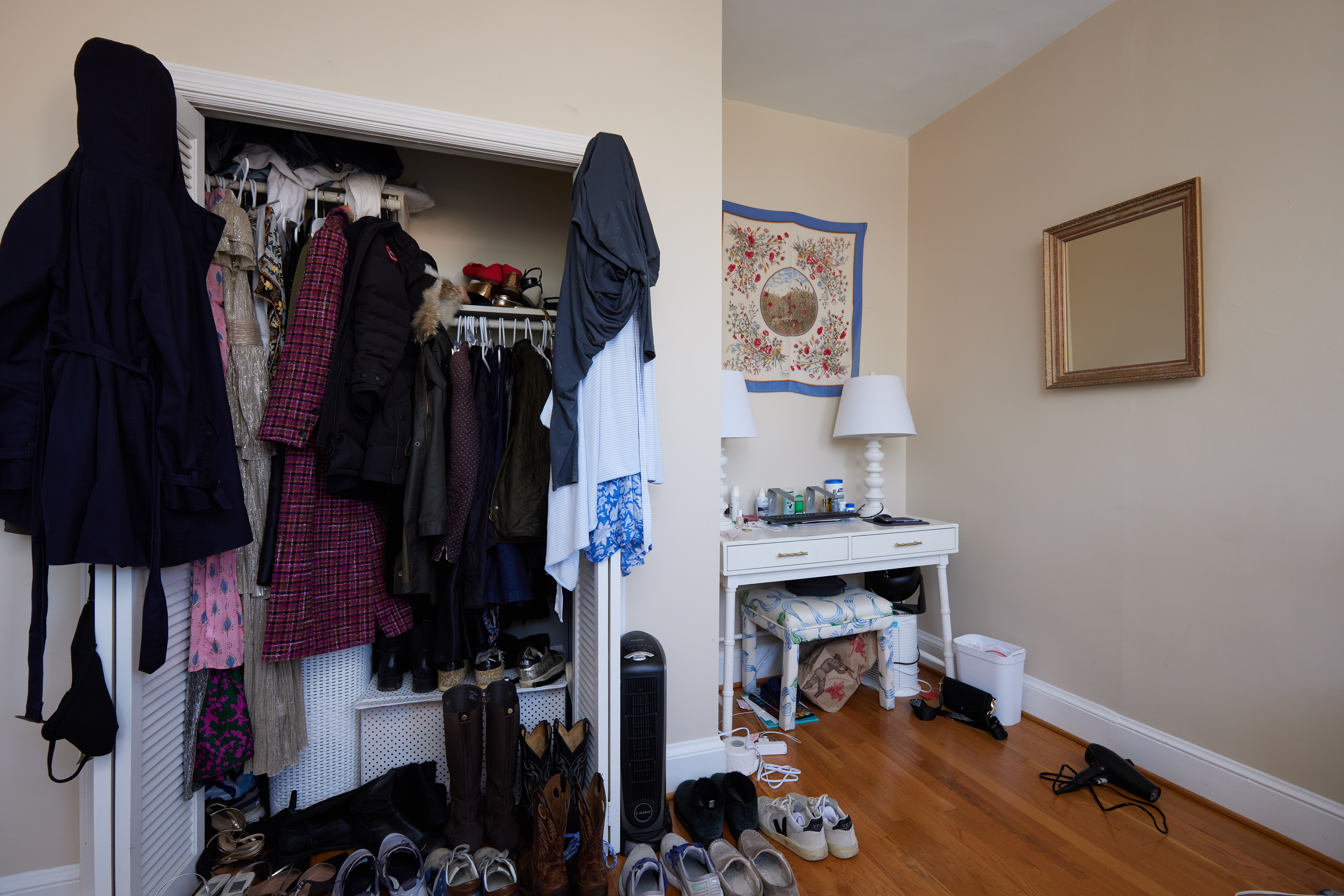 3420 R Street Northwest Washington, DC 20007 - Photo 19 of 53 a view of walk in closet with clothes and shoes