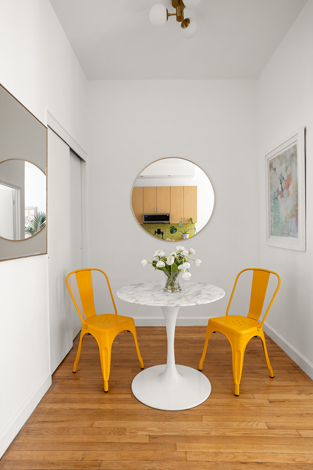 350 West 20th Street, Unit 3R Manhattan, NY 10011 - Photo 3 of 7 a view of a dining room with furniture and wooden floor