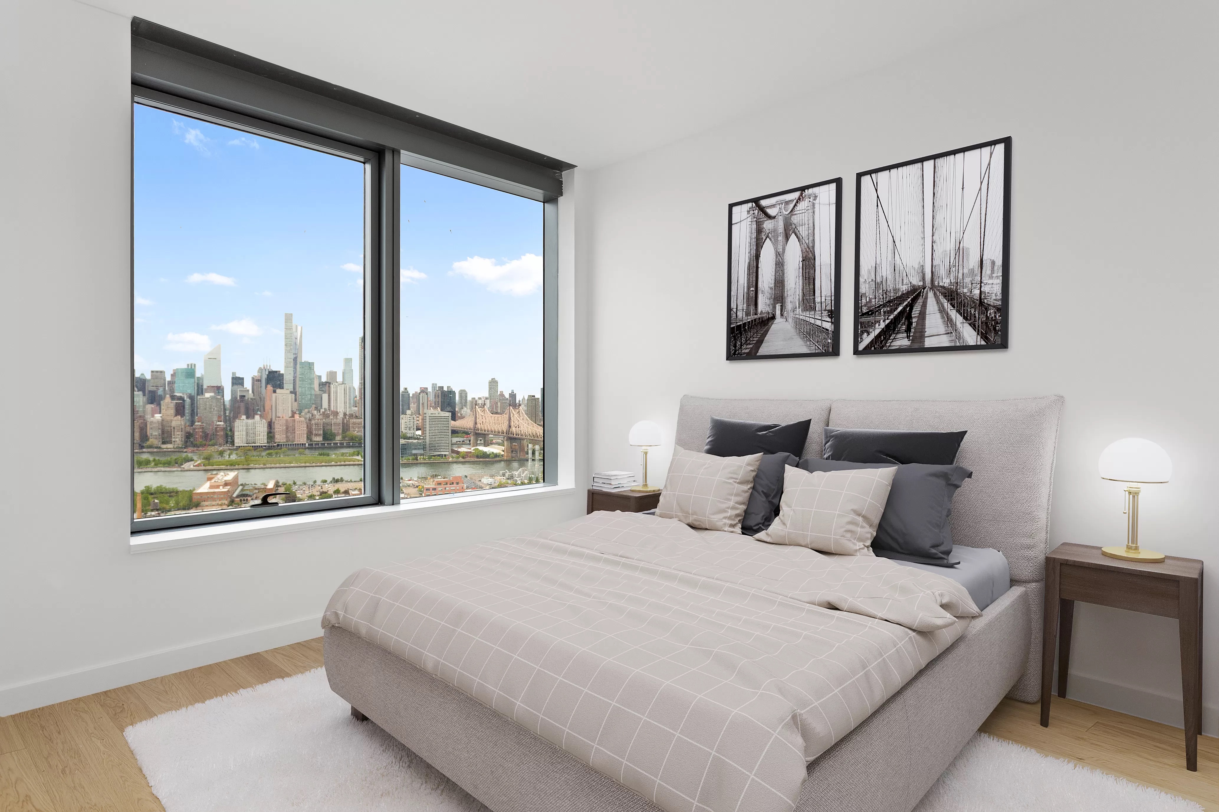 3 Court Square, Unit 3212 Queens, NY 11101 - Photo 4 of 14 a bedroom with a large bed and a large window
