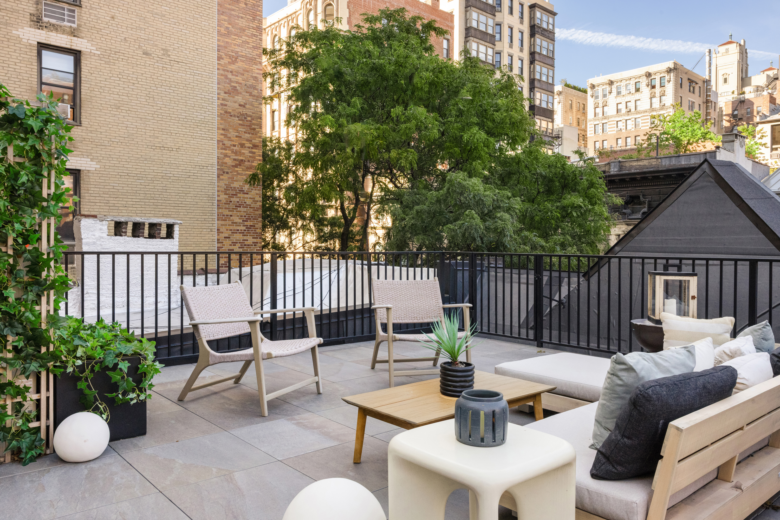 344 West 84th Street, Unit PH Manhattan, NY 10024 - Photo 13 of 19 a view of a patio with a chairs and a table