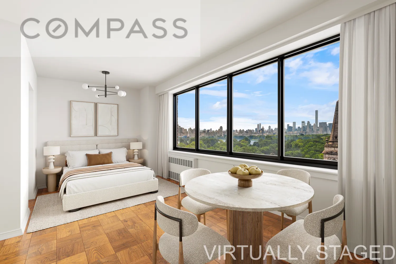 a bedroom with furniture and a large window