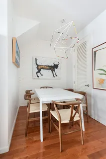 a room with furniture and wooden floor