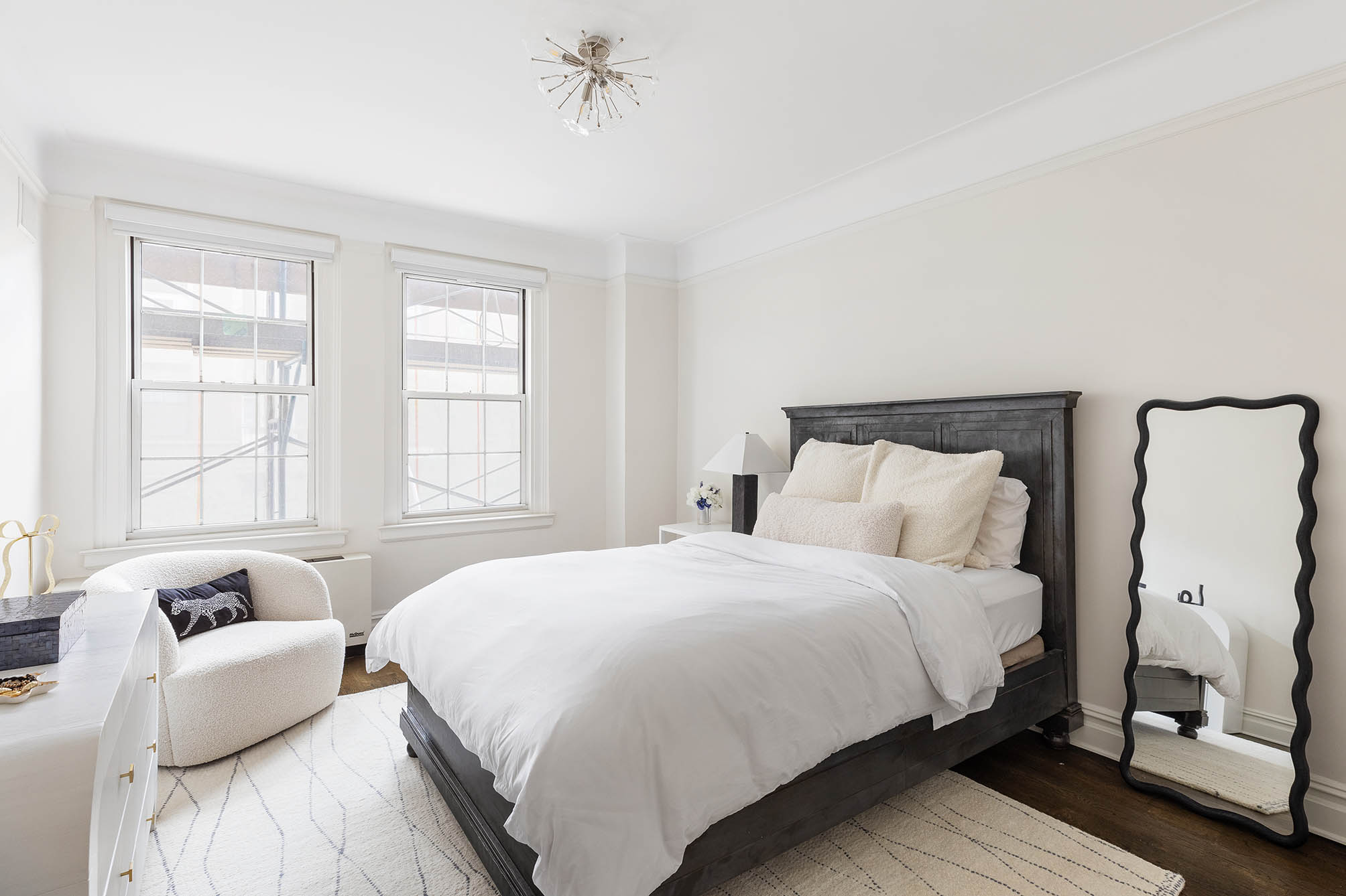 174 West 76th Street, Unit 4GH Manhattan, NY 10023 - Photo 9 of 16 a bedroom with bed and window