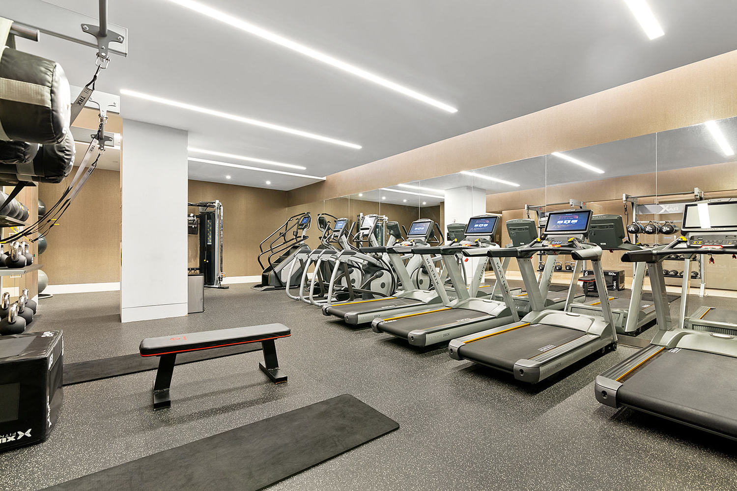 49 Chambers Street, Unit 15B Manhattan, NY 10007 - Photo 13 of 20 a view of a room with gym equipment