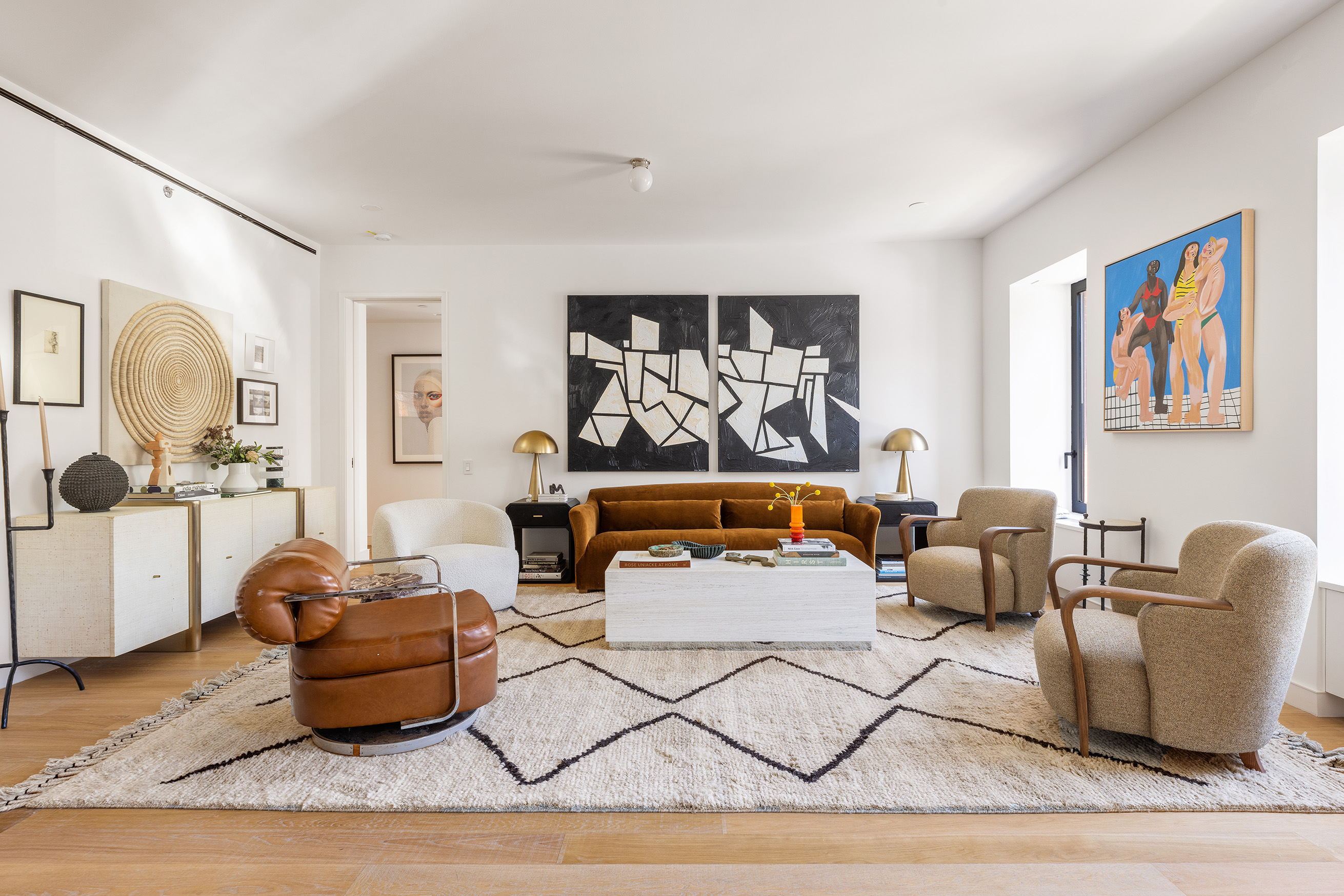 500 West 22nd Street, Unit 2A Manhattan, NY 10011 - Photo 5 of 19 a living room with furniture and painting on the wall