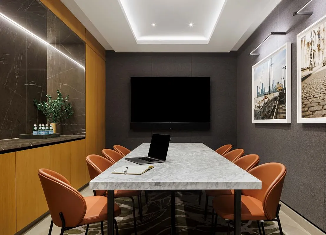 450 Washington Street, Unit 202 Manhattan, NY 10013 - Photo 10 of 14 a table and chairs in a room with a flat screen tv