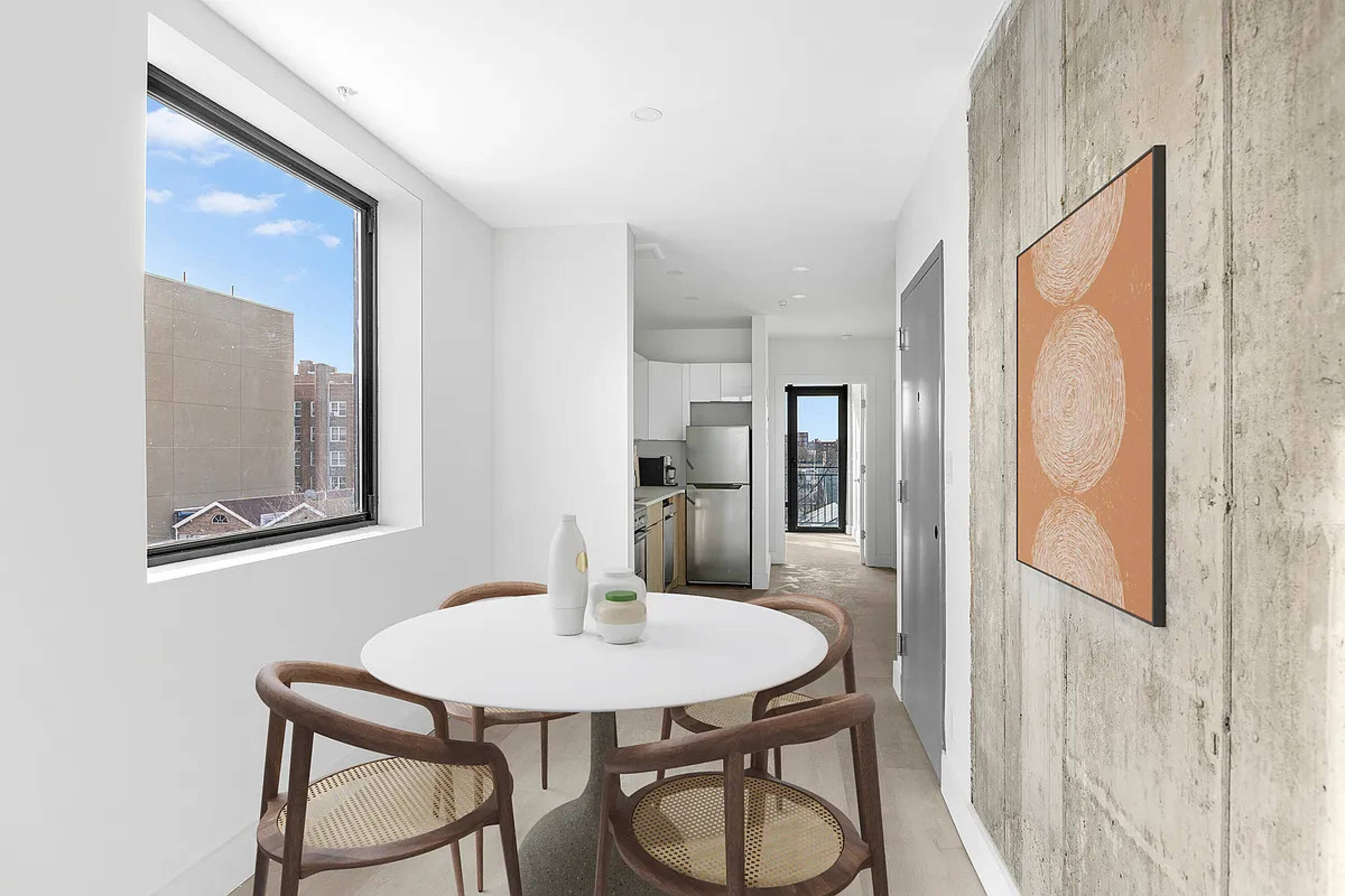 485 East 28th Street Brooklyn, NY 11226 - Photo 9 of 17 a view of a dining room with furniture and wooden floor