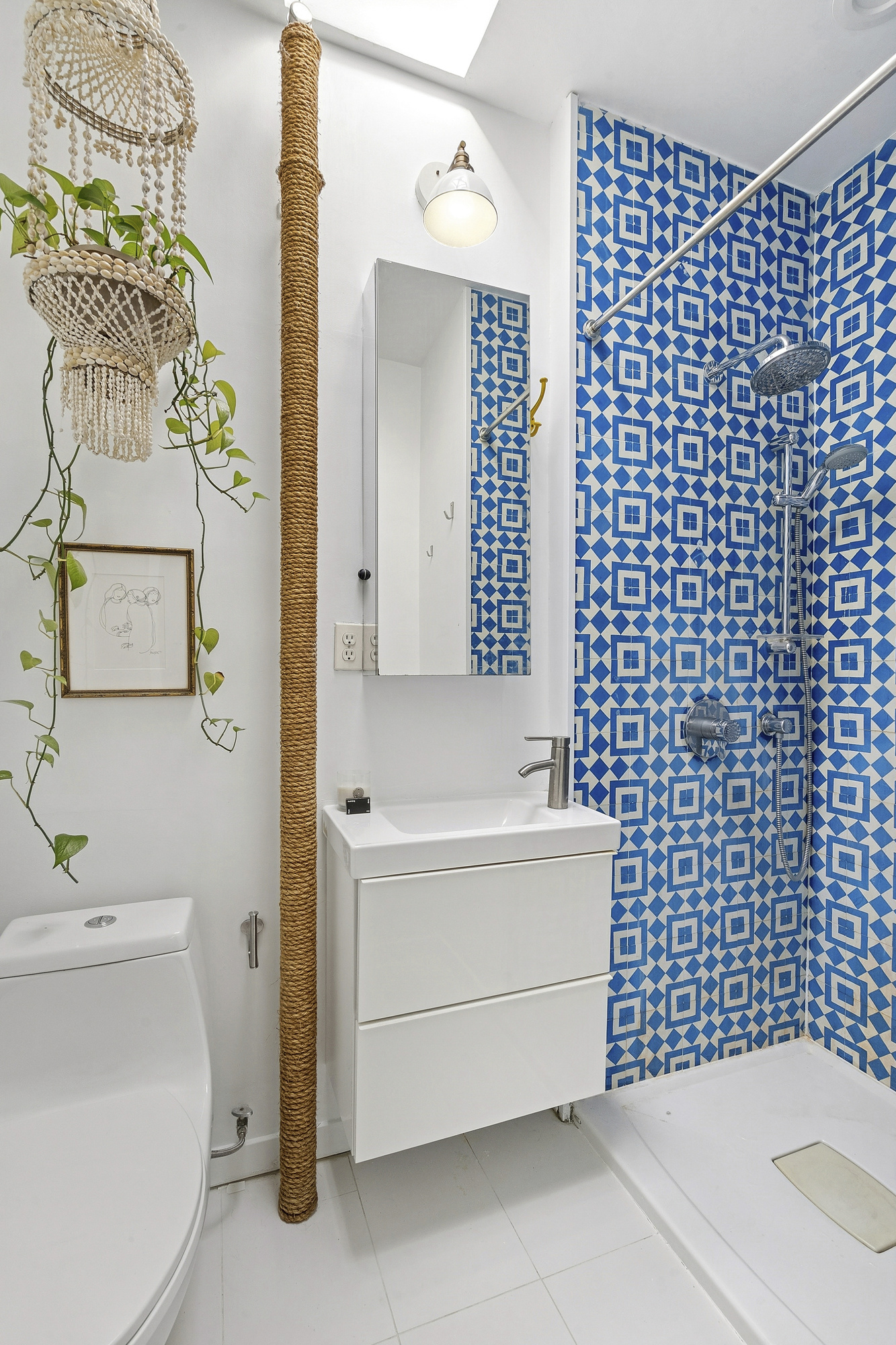 184 Clinton Avenue, Unit 4A Brooklyn, NY 11205 - Photo 6 of 9 a bathroom with a sink a toilet and shower