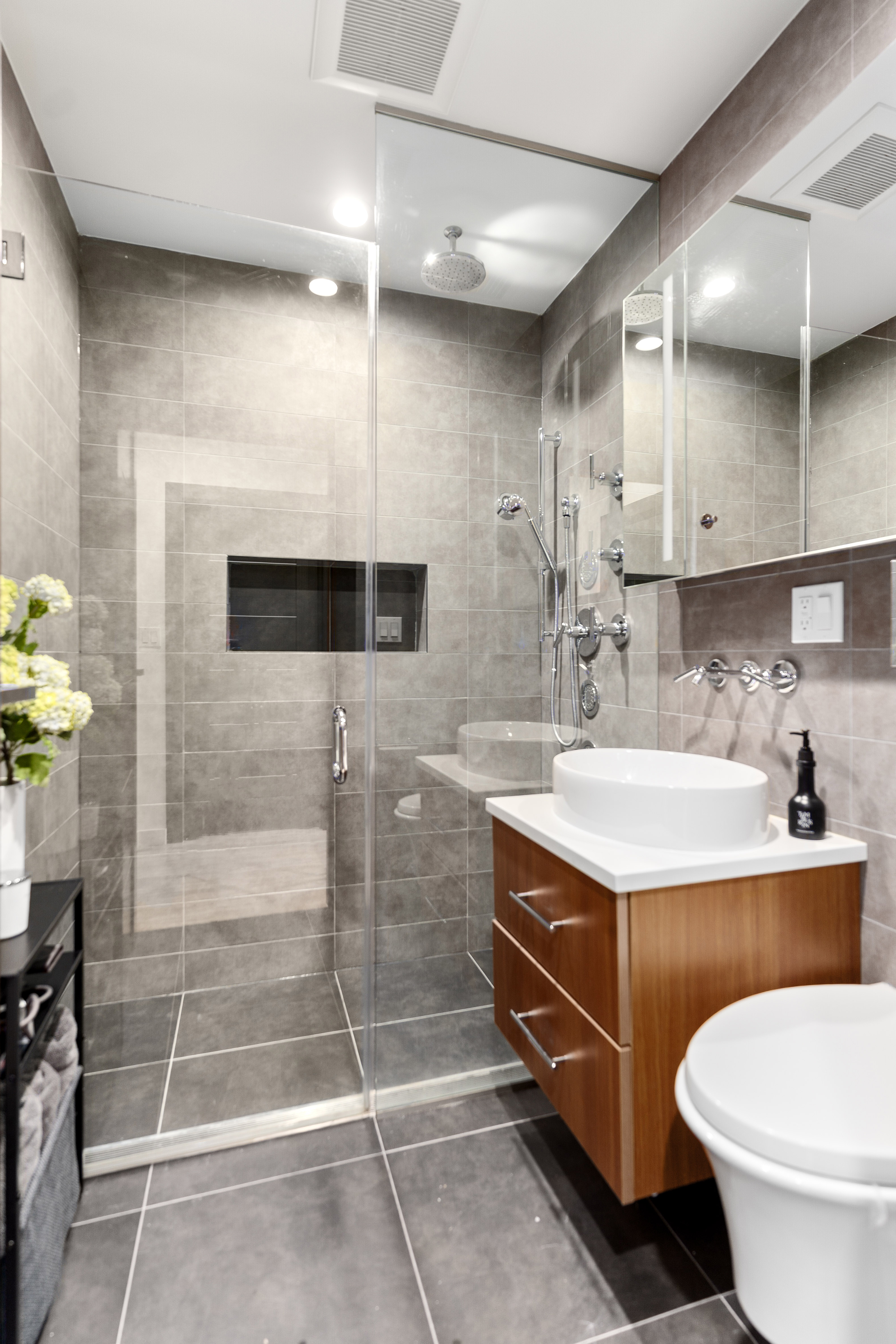 261 Union Avenue, Unit 4 Brooklyn, NY 11211 - Photo 6 of 13 a bathroom with a sink a toilet and shower