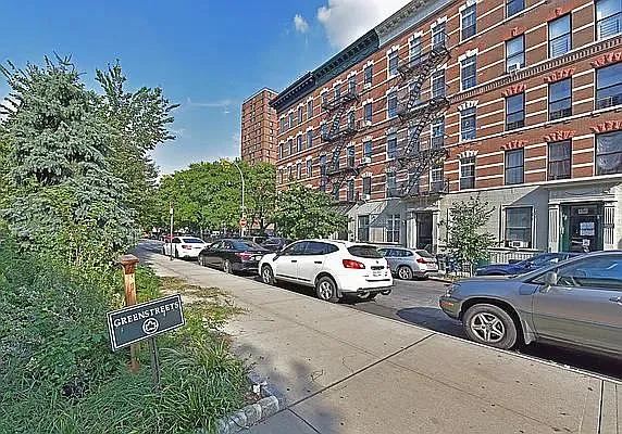 138 Edgecombe Avenue, Unit 3A Manhattan, NY 10030 - Photo 9 of 10 a view of a car parked in front of a building