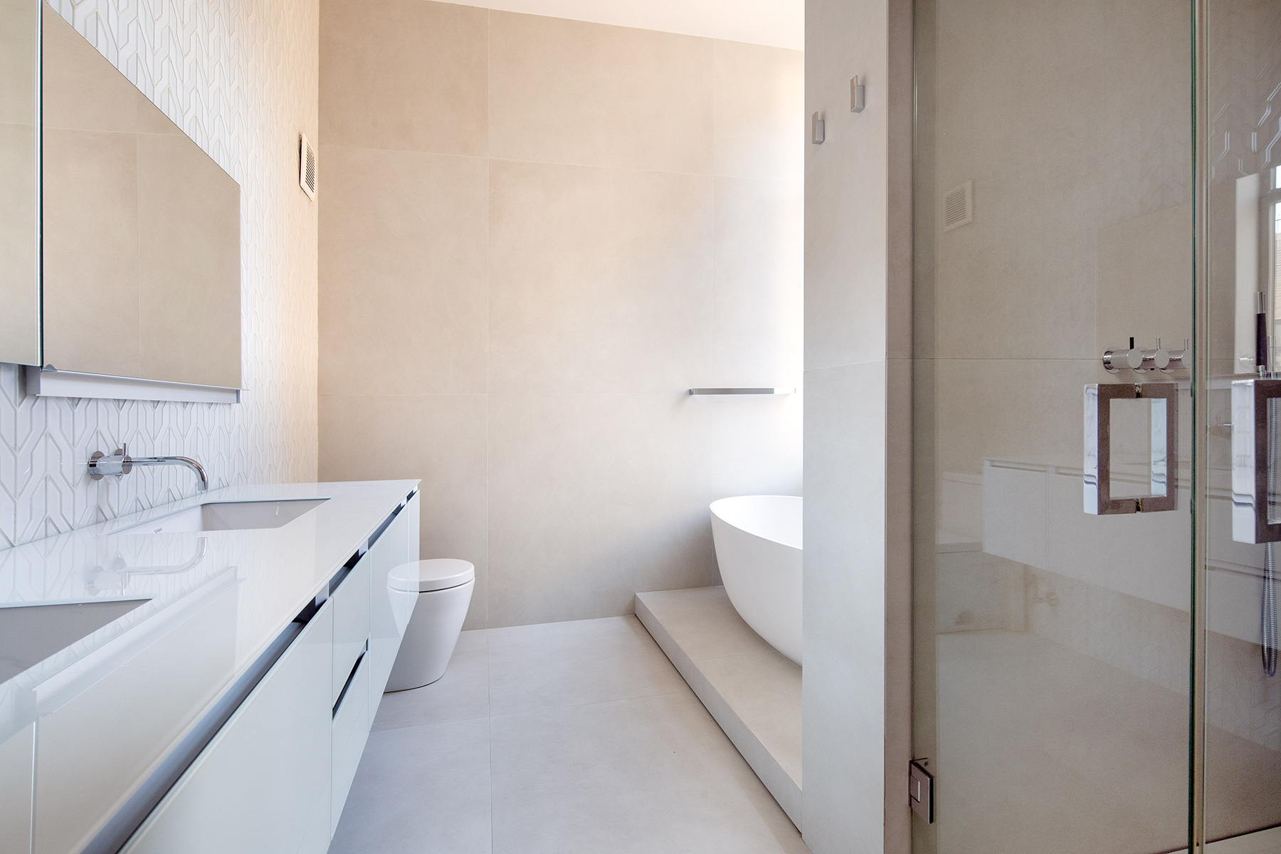 252 7th Avenue, Unit 10X Manhattan, NY 10001 - Photo 9 of 20 a bathroom with a sink a toilet and shower