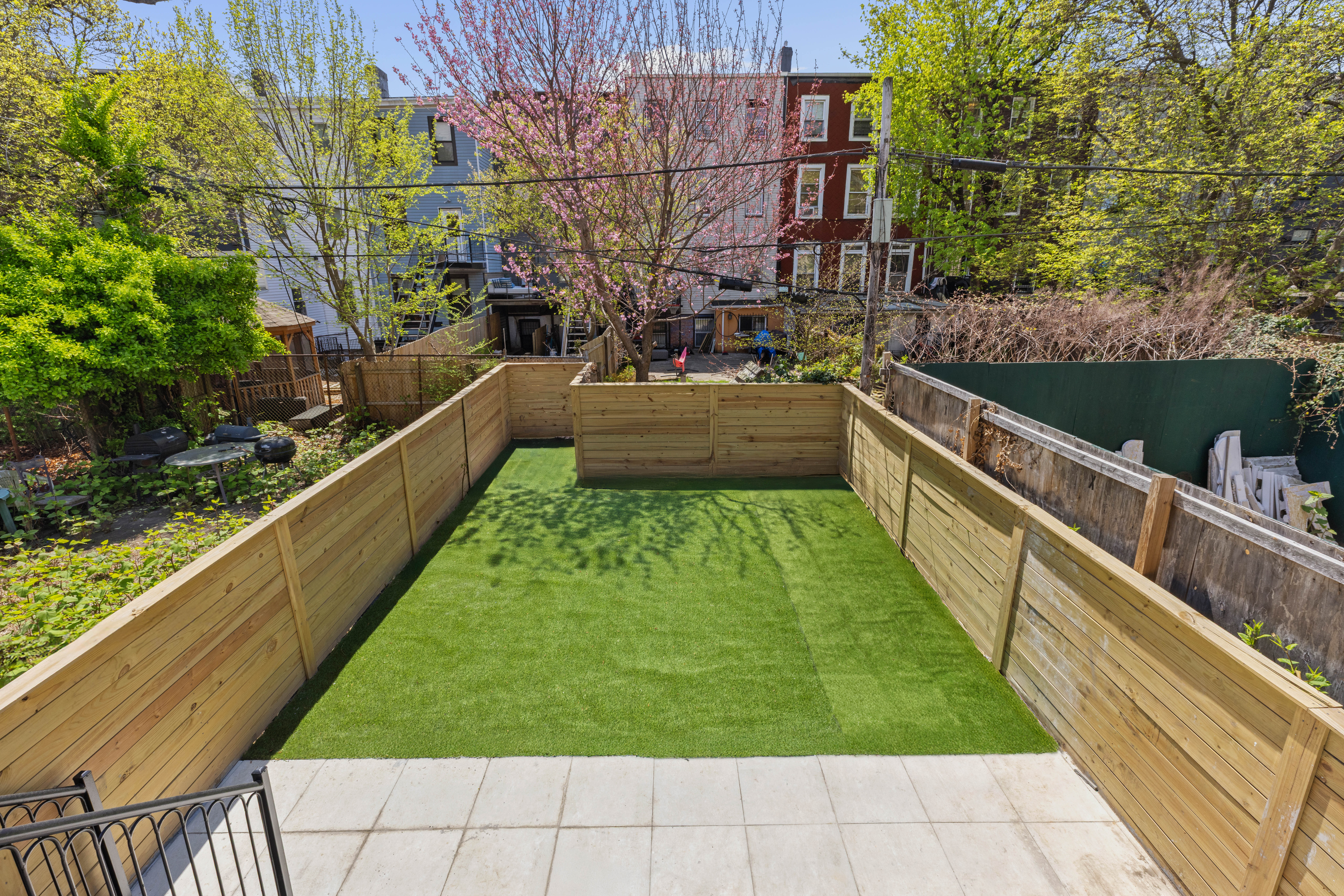 196 Monroe Street Brooklyn, NY 11216 - Photo 19 of 22 a view of balcony with yard