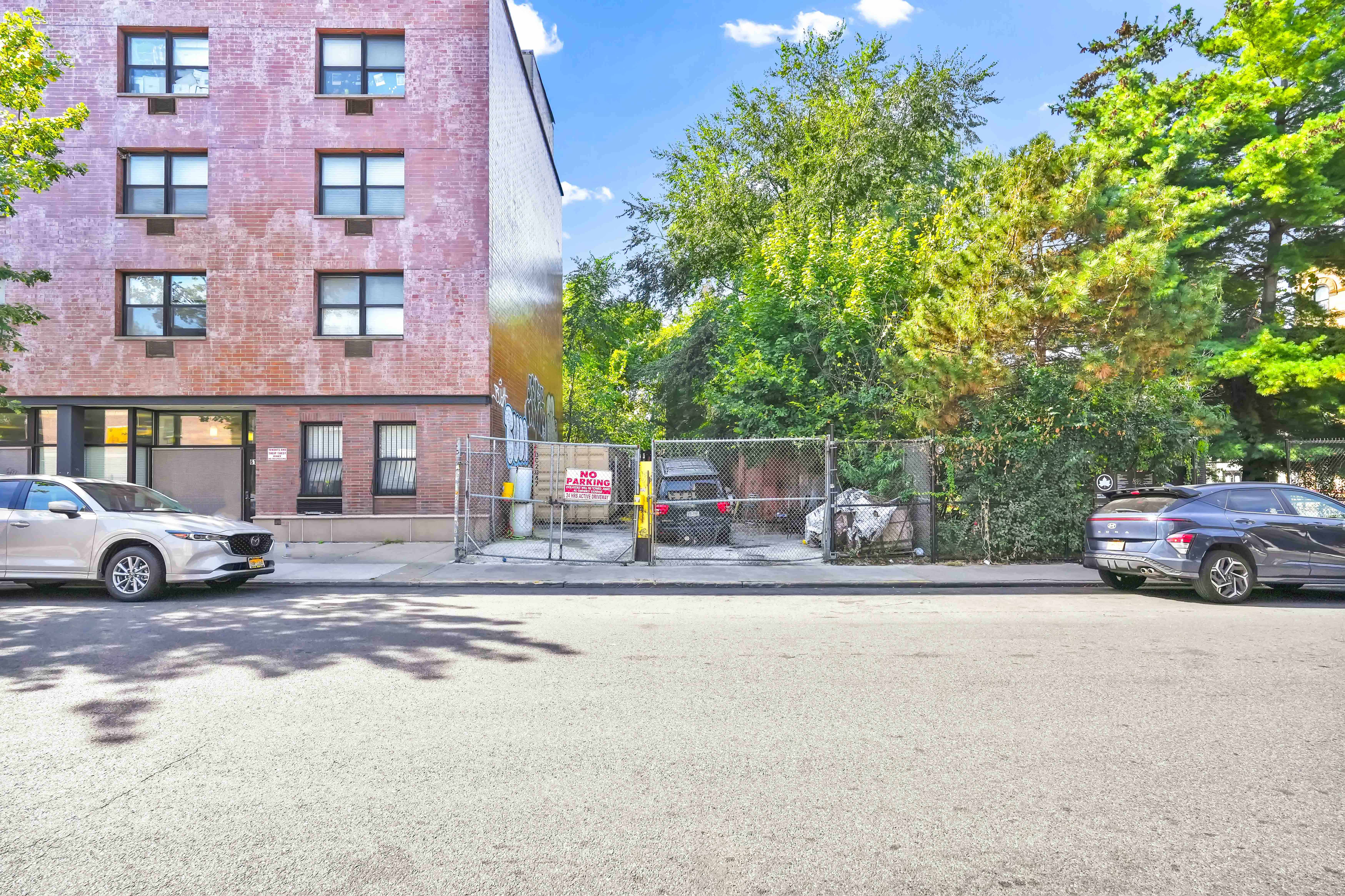 610 Marcy Avenue Brooklyn, NY 11206 - Photo 14 of 20 a view of street with parked cars