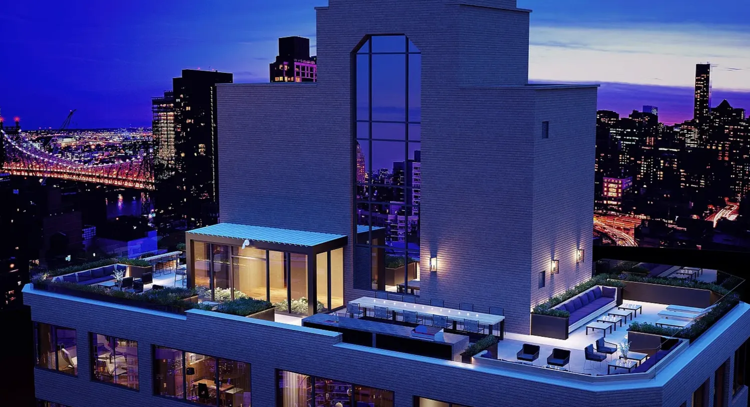 a front view of a building with sitting area