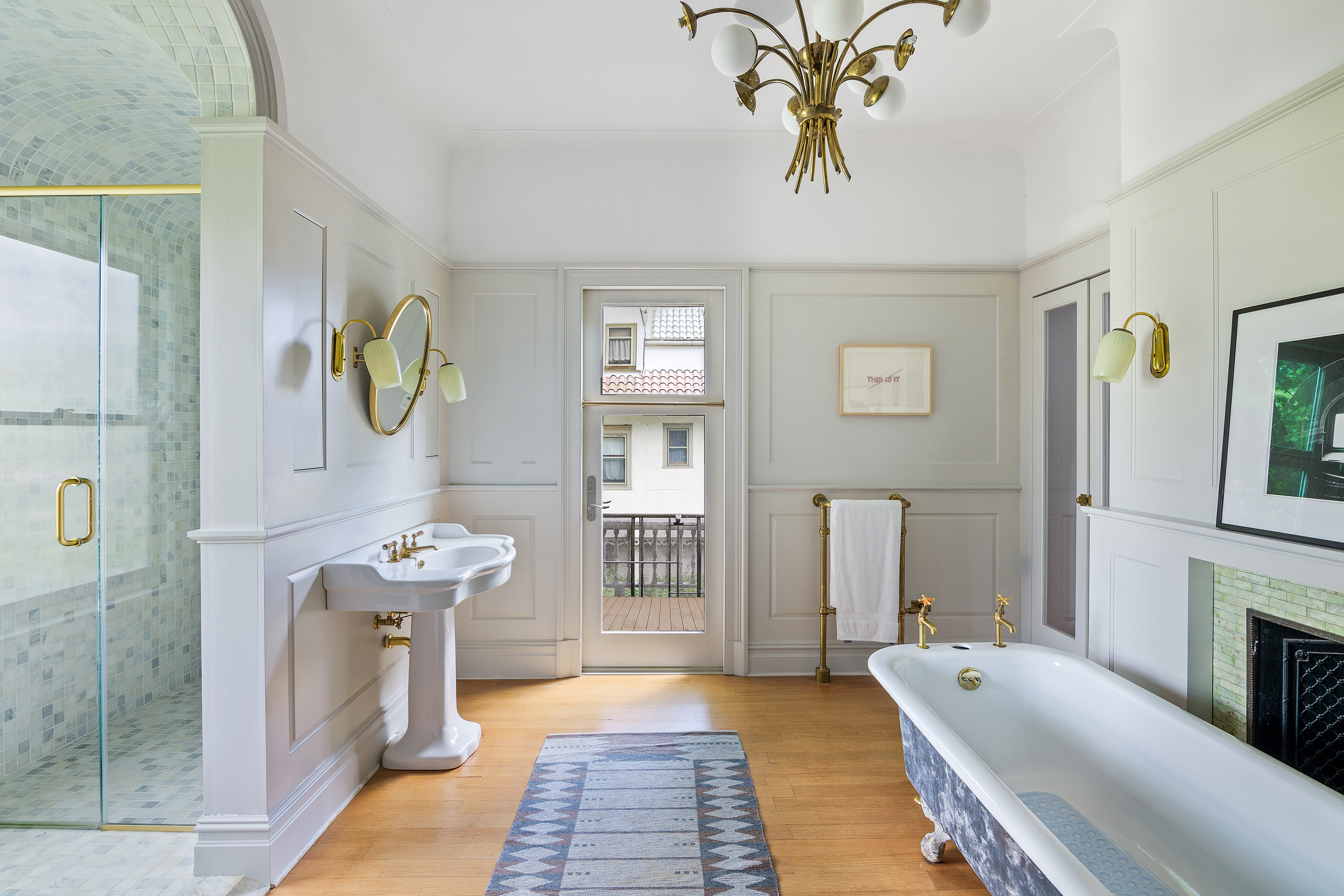 1440 Albemarle Road Brooklyn, NY 11226 - Photo 20 of 39 a spacious bedroom with a bed and a chandelier