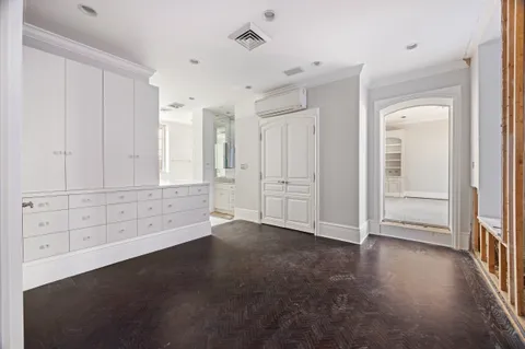 a kitchen with stainless steel appliances granite countertop a stove and a refrigerator
