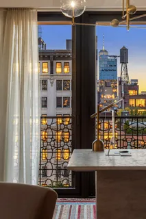 a view of a living room and window