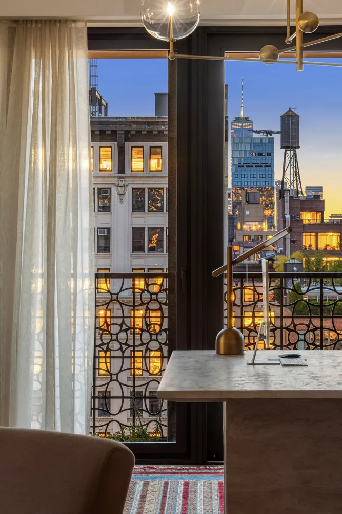 a view of a living room and window