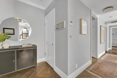 a view of a kitchen from the hallway