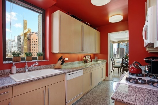2 Columbus Avenue, Unit 16B Manhattan, NY 10023 - Photo 3 of 5 a bathroom with a double vanity sink and a mirror