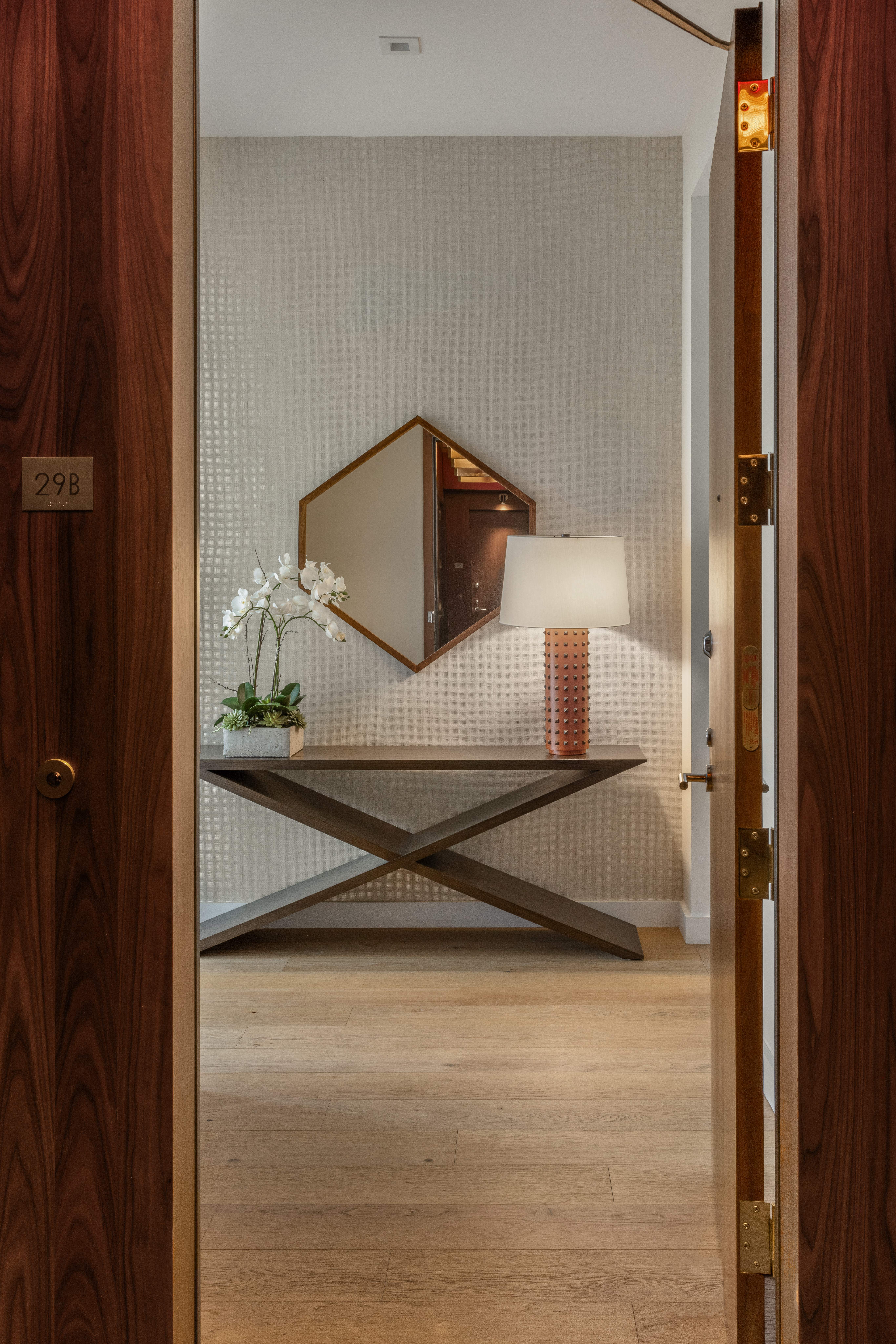 360 East 89th Street, Unit 29B Manhattan, NY 10128 - Photo 15 of 22 a bathroom with a sink and mirror