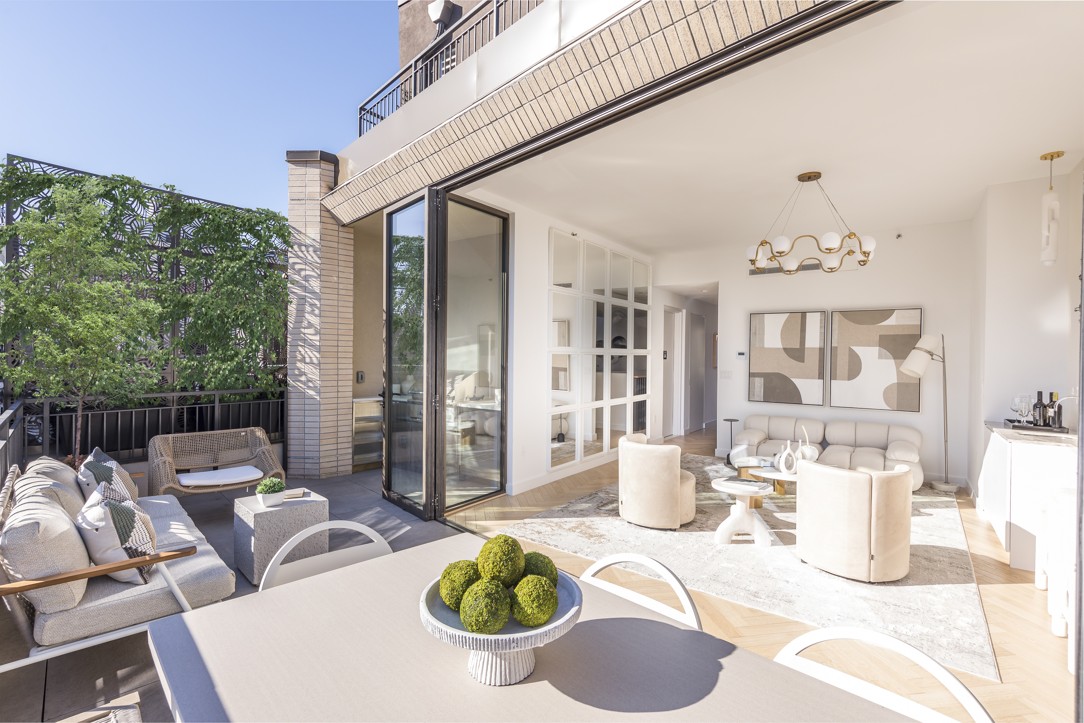 378 Broome Street, Unit PH Manhattan, NY 10013 - Photo 1 of 25 a living room with furniture and a large window
