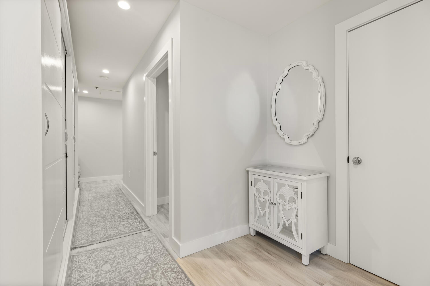 234 Causeway Street, Unit 709 Boston, MA 02114 - Photo 19 of 28 a view of a hallway with wooden floor