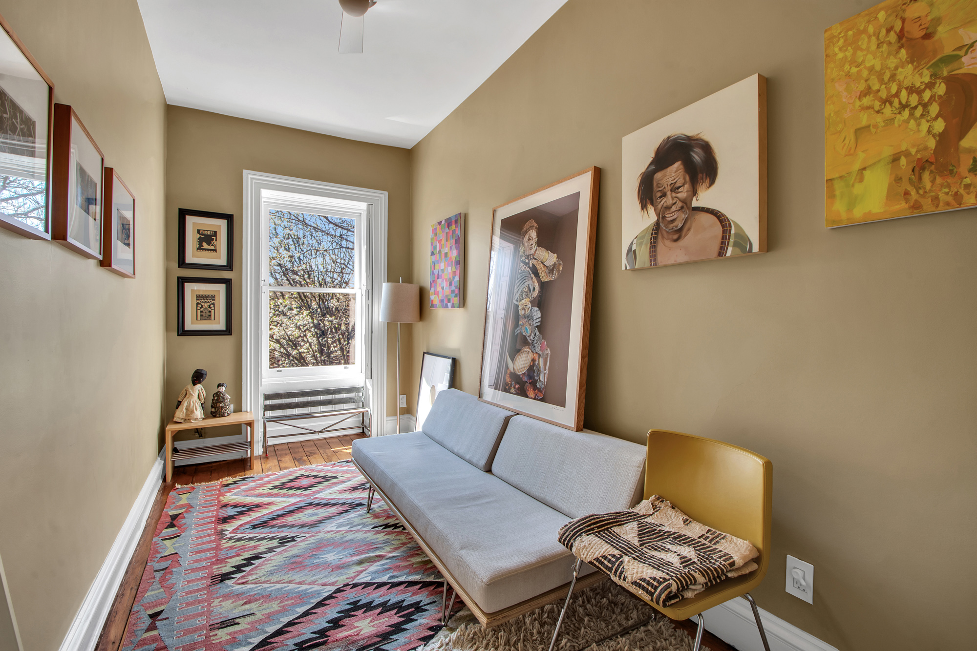 383 Grand Avenue Brooklyn, NY 11238 - Photo 22 of 32 a living room with furniture and wooden floor