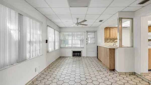 a view of an empty room with a window