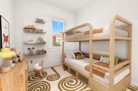 a bedroom with a bed and lamp