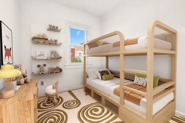 a bedroom with a bed and lamp