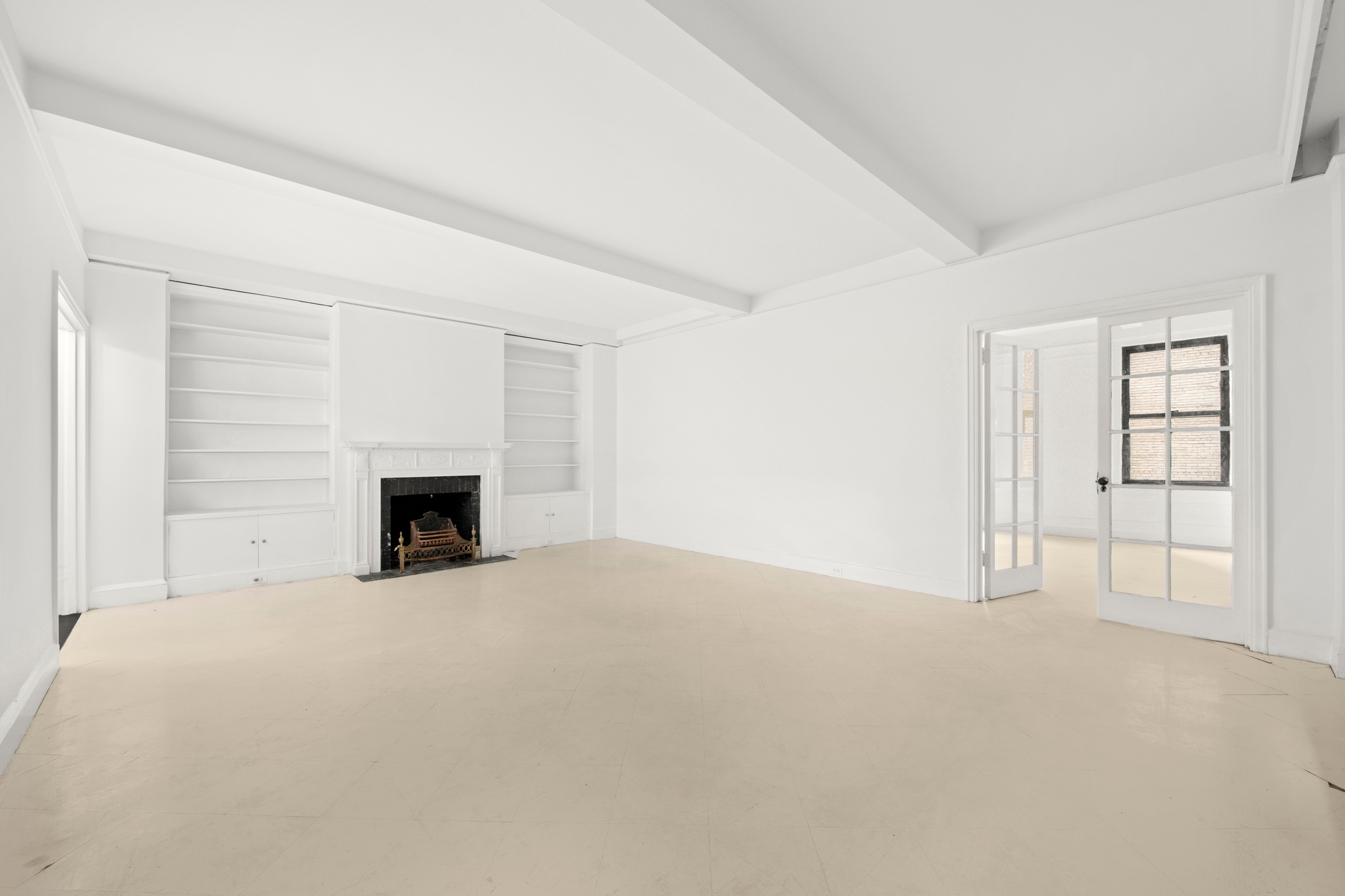 55 East 72nd Street, Unit 2NORTH Manhattan, NY 10021 - Photo 2 of 18 an empty room with windows