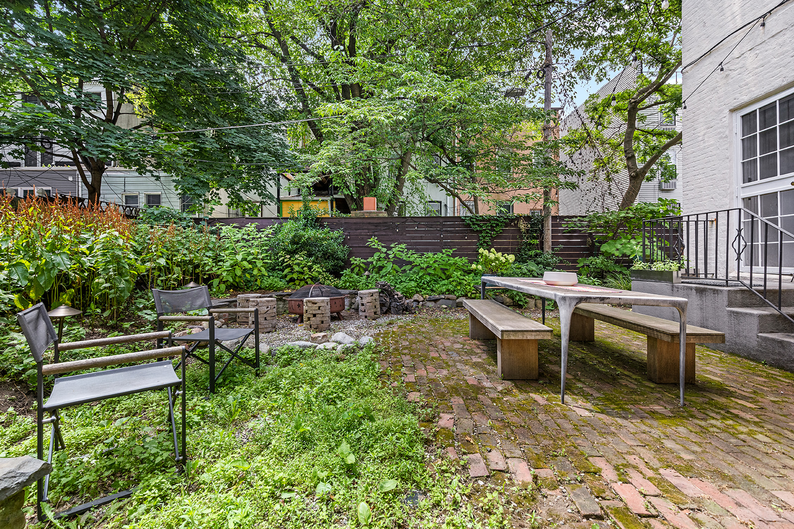 110 Clinton Avenue, Unit 1C Brooklyn, NY 11205 - Photo 2 of 12 a view of a bench in a garden