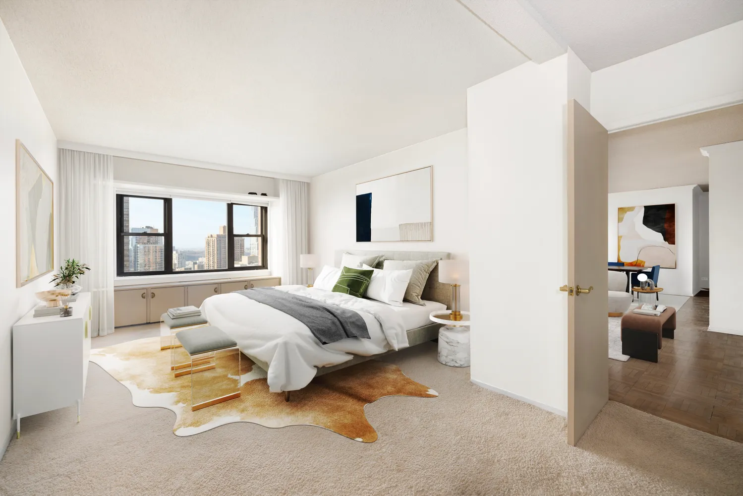 a spacious bedroom with a bed and a couch