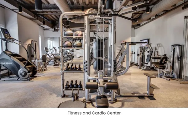 a building outdoor space with patio furniture and potted plants