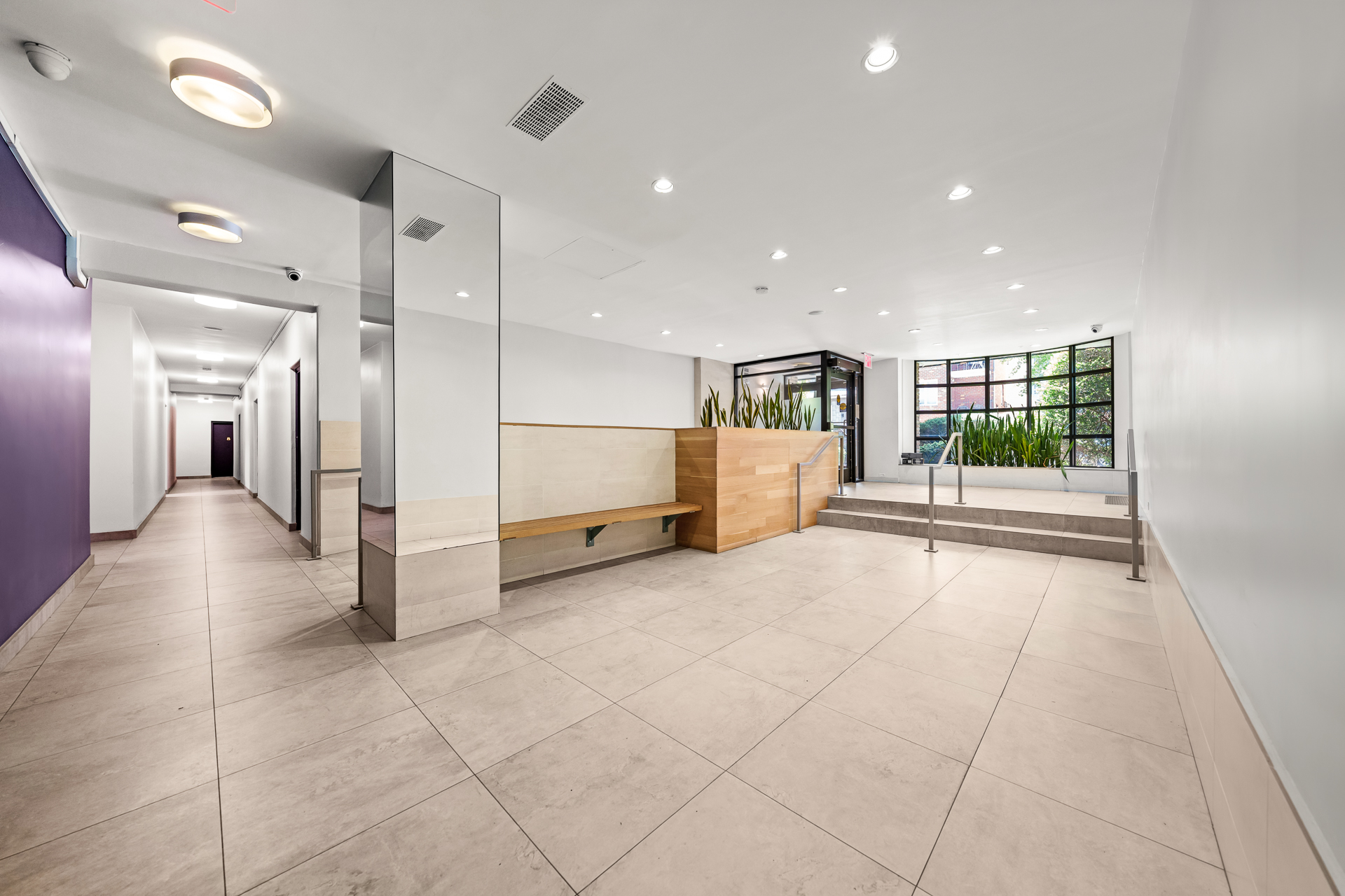 495 East 7th Street, Unit 7D Brooklyn, NY 11218 - Photo 8 of 10 a view of an empty room with a window