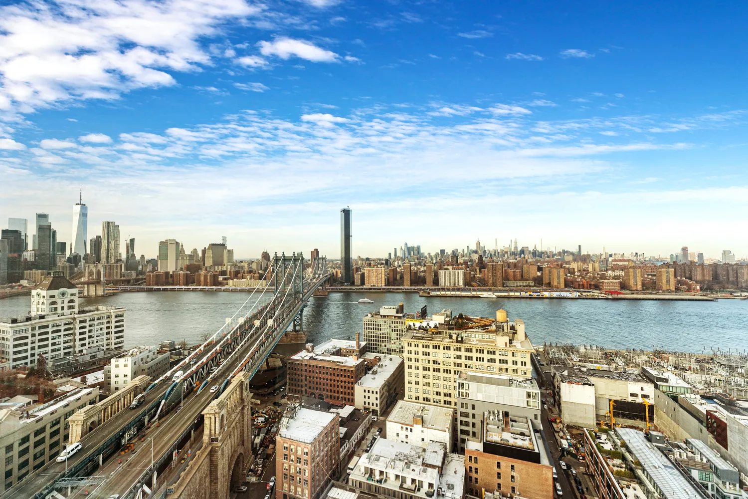 a view of a lake with a city view