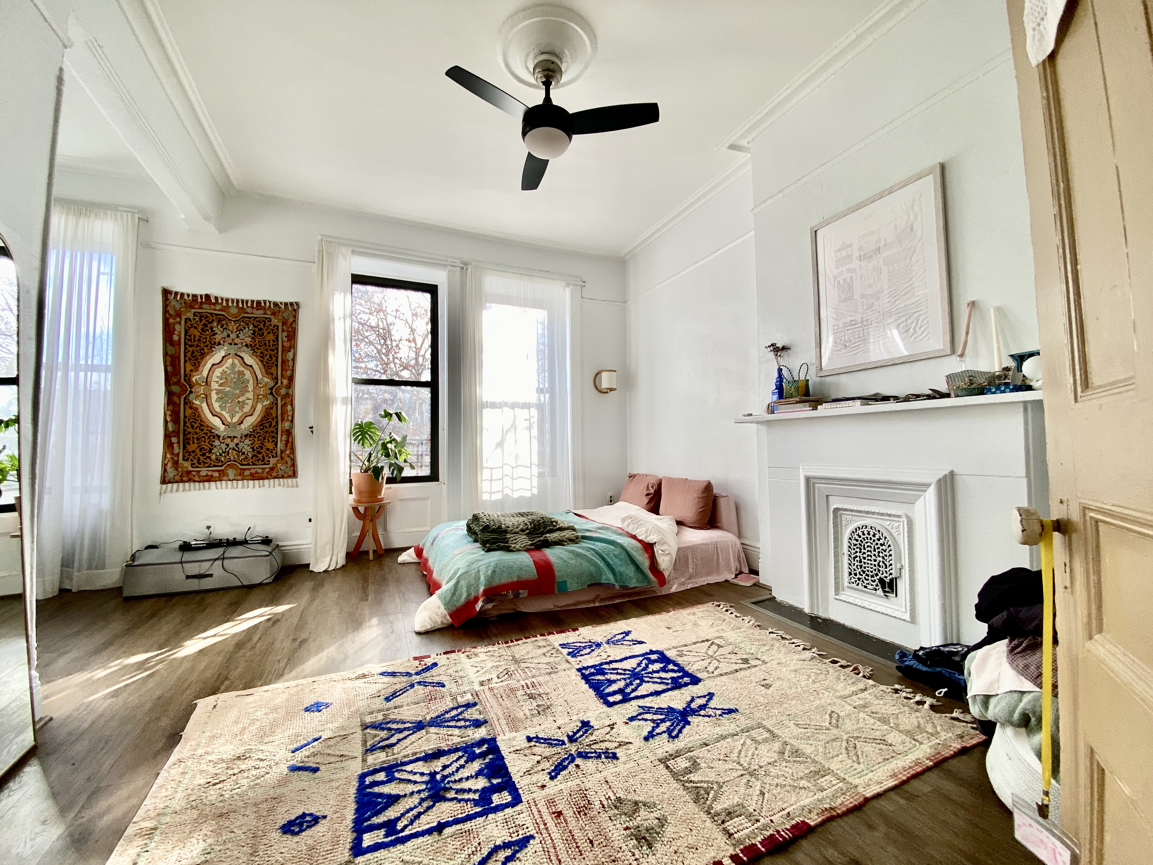 441 MacDonough Street, Unit 3 Brooklyn, NY 11233 - Photo 3 of 6 a living room with furniture and a fireplace