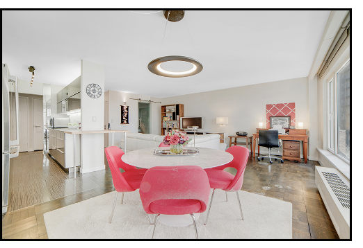 200 Central Park South, Unit 7Q Manhattan, NY 10019 - Photo 2 of 6 a living room with furniture and kitchen view