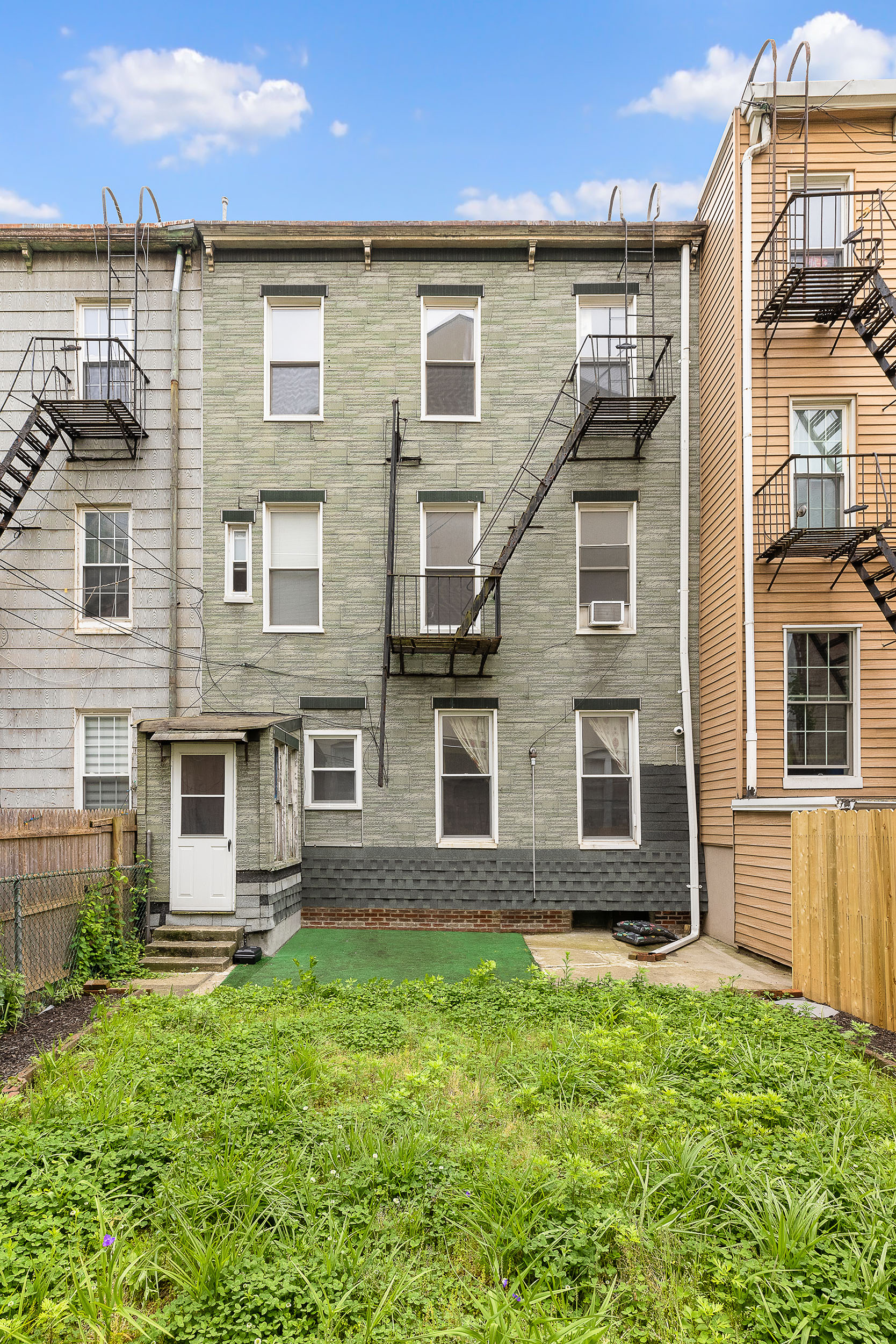 39 Broome Street Brooklyn, NY 11222 - Photo 15 of 16 front view of a house with a yard