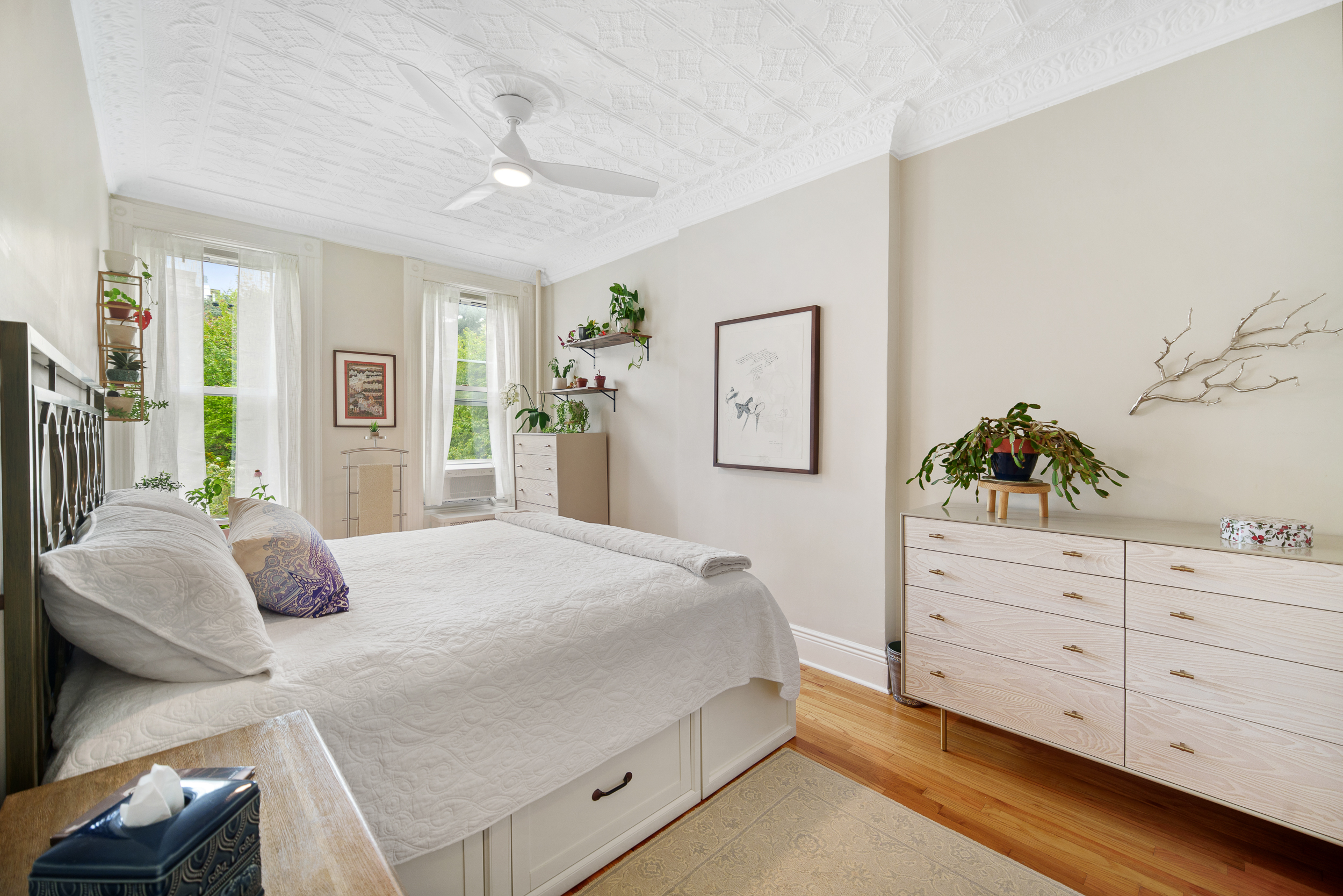 182 Saint Marks Avenue, Unit 2 Brooklyn, NY 11238 - Photo 8 of 14 a bedroom with a bed and a dresser