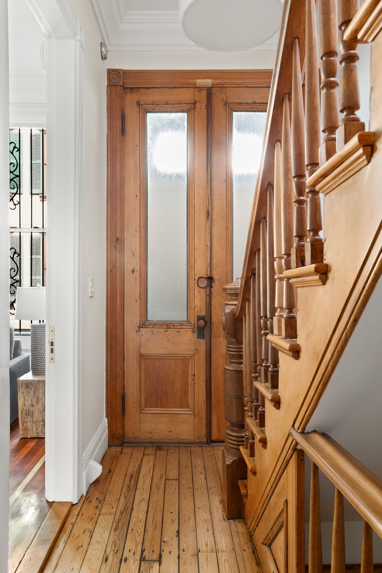 8 Sylvan Terrace Manhattan, NY 10032 - Photo 8 of 19 a view of an entryway with wooden floor and stairs