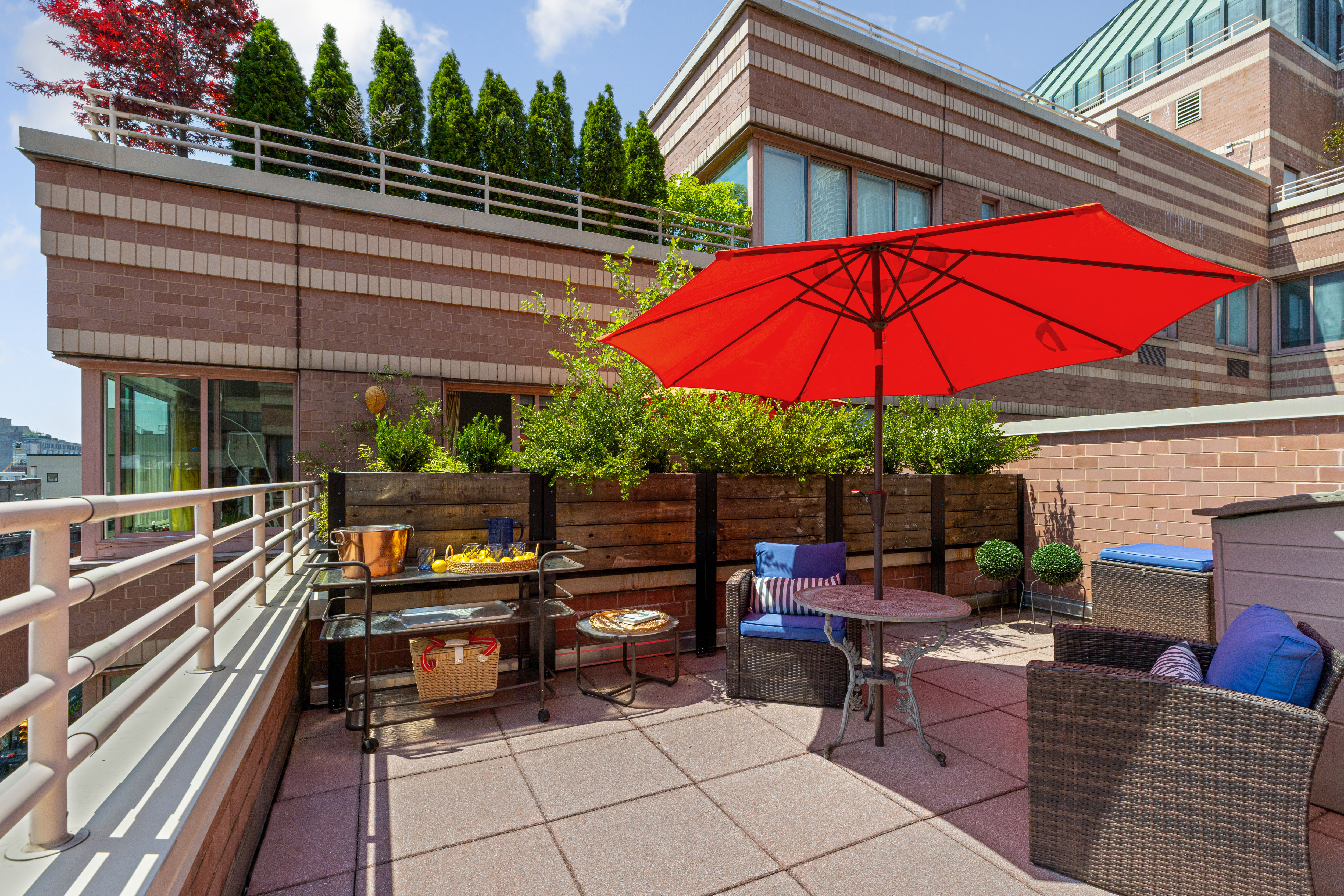 393 West 49th Street, Unit 5C Manhattan, NY 10019 - Photo 4 of 21 a view of a outdoor sitting area with chairs