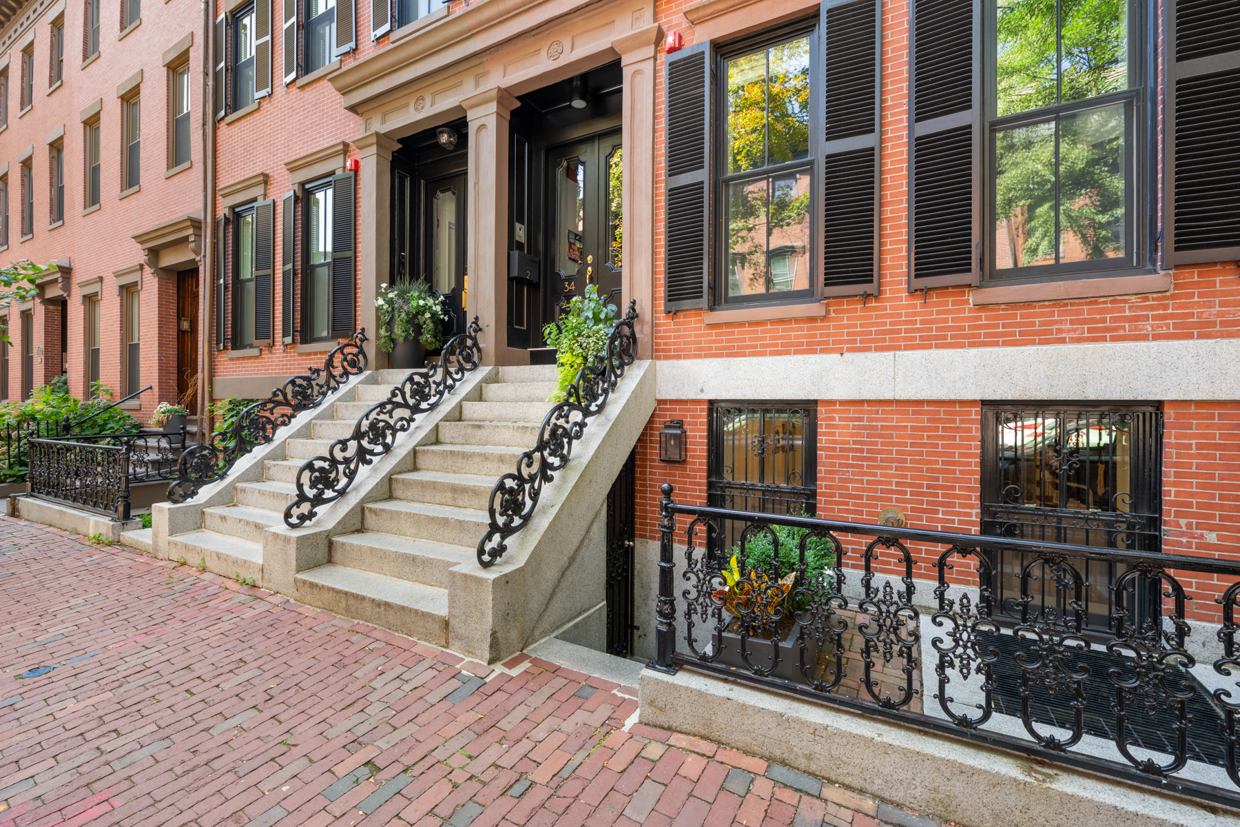 34 Dwight Street, Unit 1 Boston, MA 02118 - Photo 32 of 33 a view of a building with a porch